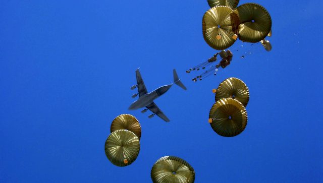 A C-17 Globemaster III aircrew executes an airdrop mission over Afghanistan. In 2008, Air Force aircraft dropped more than 15 million pounds of supplies in Iraq and Afghanistan. (U.S. Army photo/Spc. Micah E. Clare)